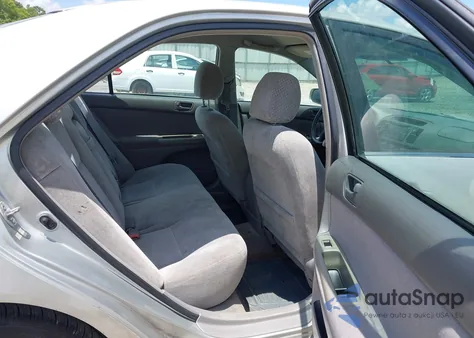 2003 Toyota Camry Le z USA, uszkodzony, nr VIN 4T1BE32KX3U698653